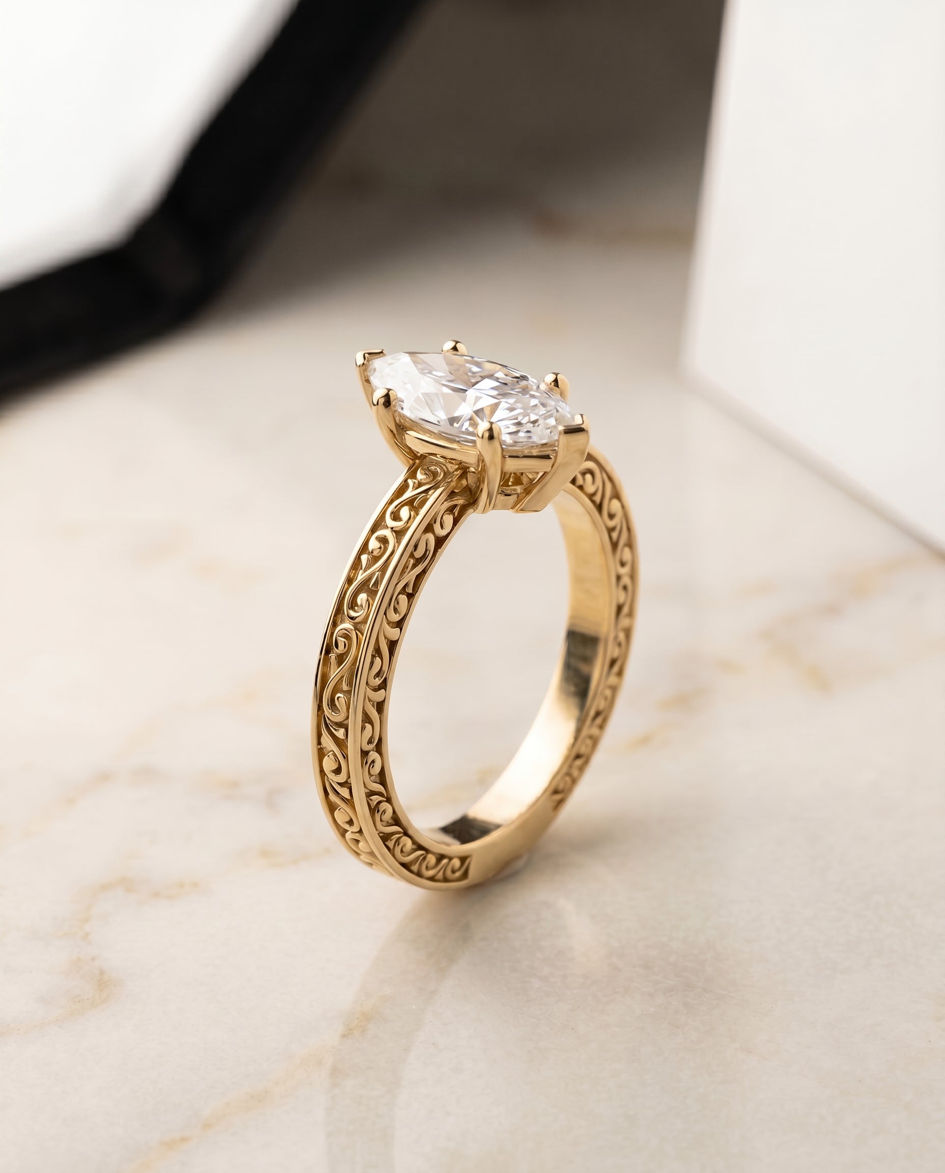 The Veronica setting for marquise diamonds, made to order in 18K Yellow Gold | RockHer