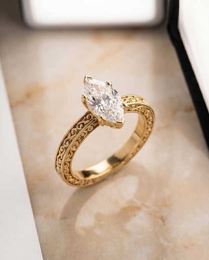 Veronica Select Vintage Solitaire Marquise Lab Diamond Engagement Ring in 18K Yellow Gold, shown on hand, angled | RockHer