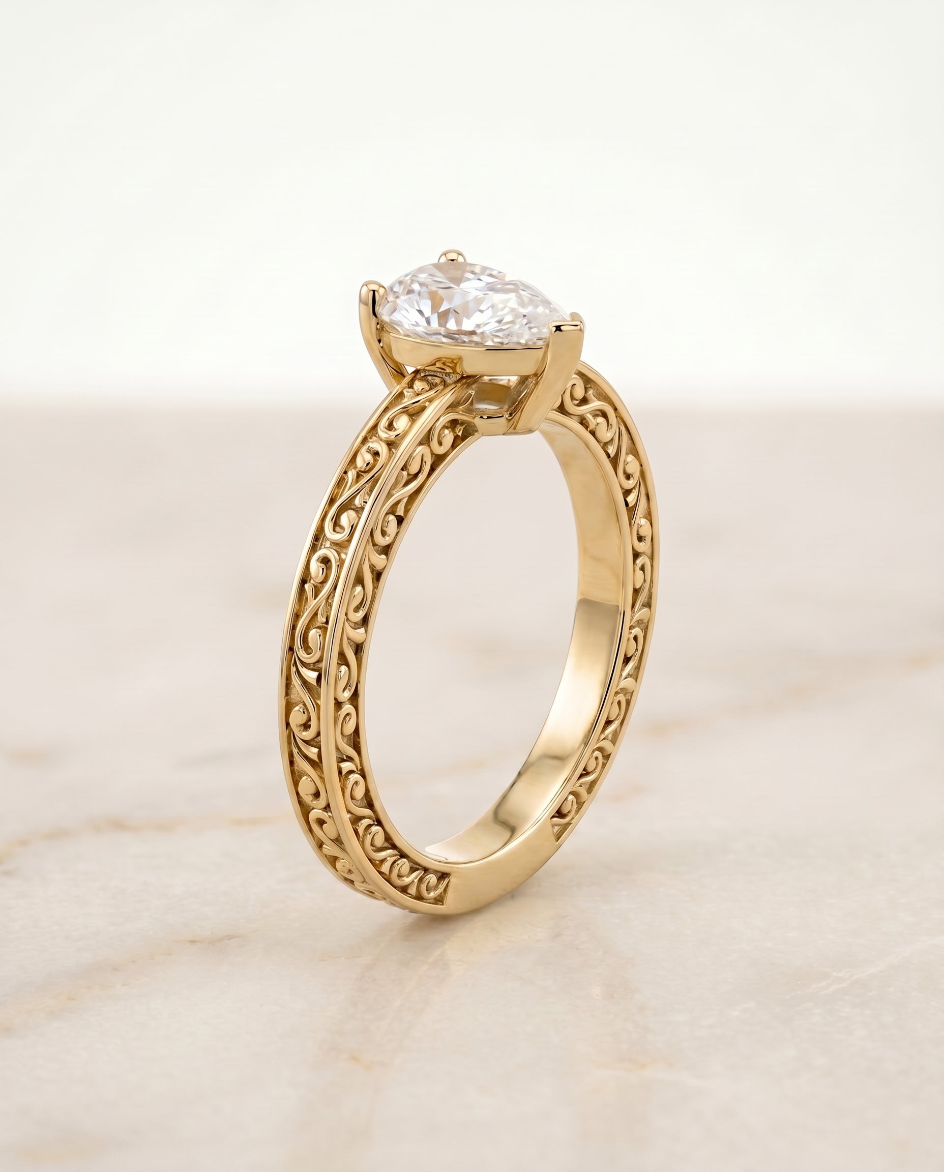 The Veronica setting for pear diamonds, made to order in 18K Yellow Gold | RockHer