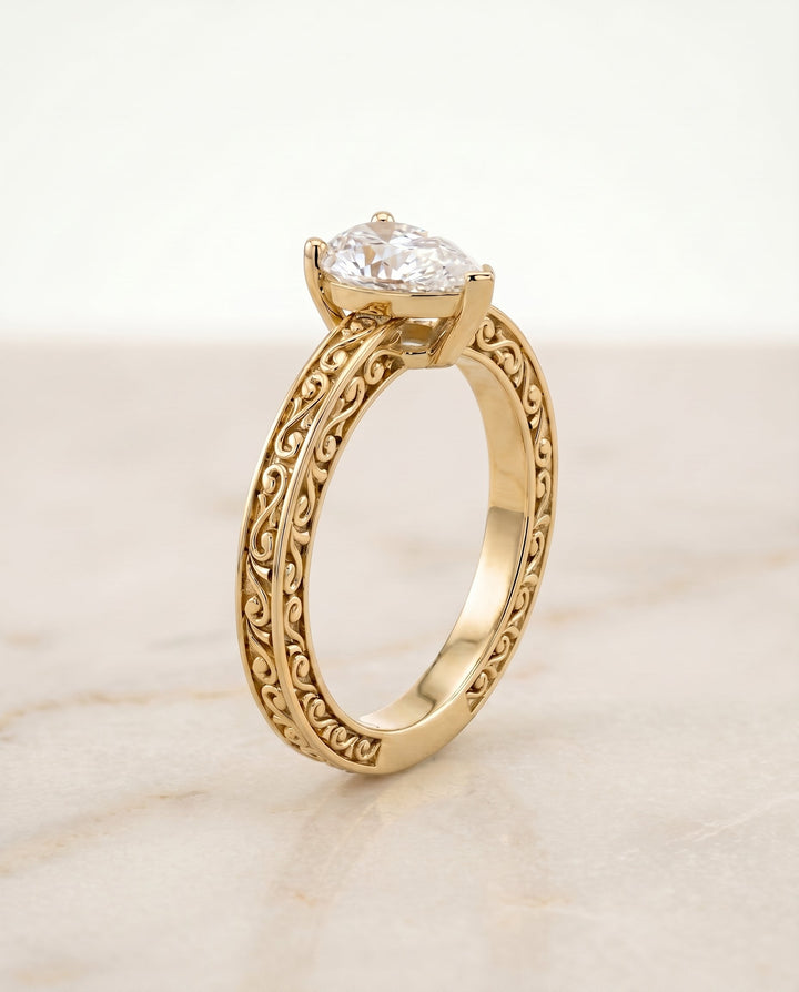 Veronica Select Vintage Solitaire Pear Lab Diamond Engagement Ring in 18K Yellow Gold, shown on hand, angled | RockHer