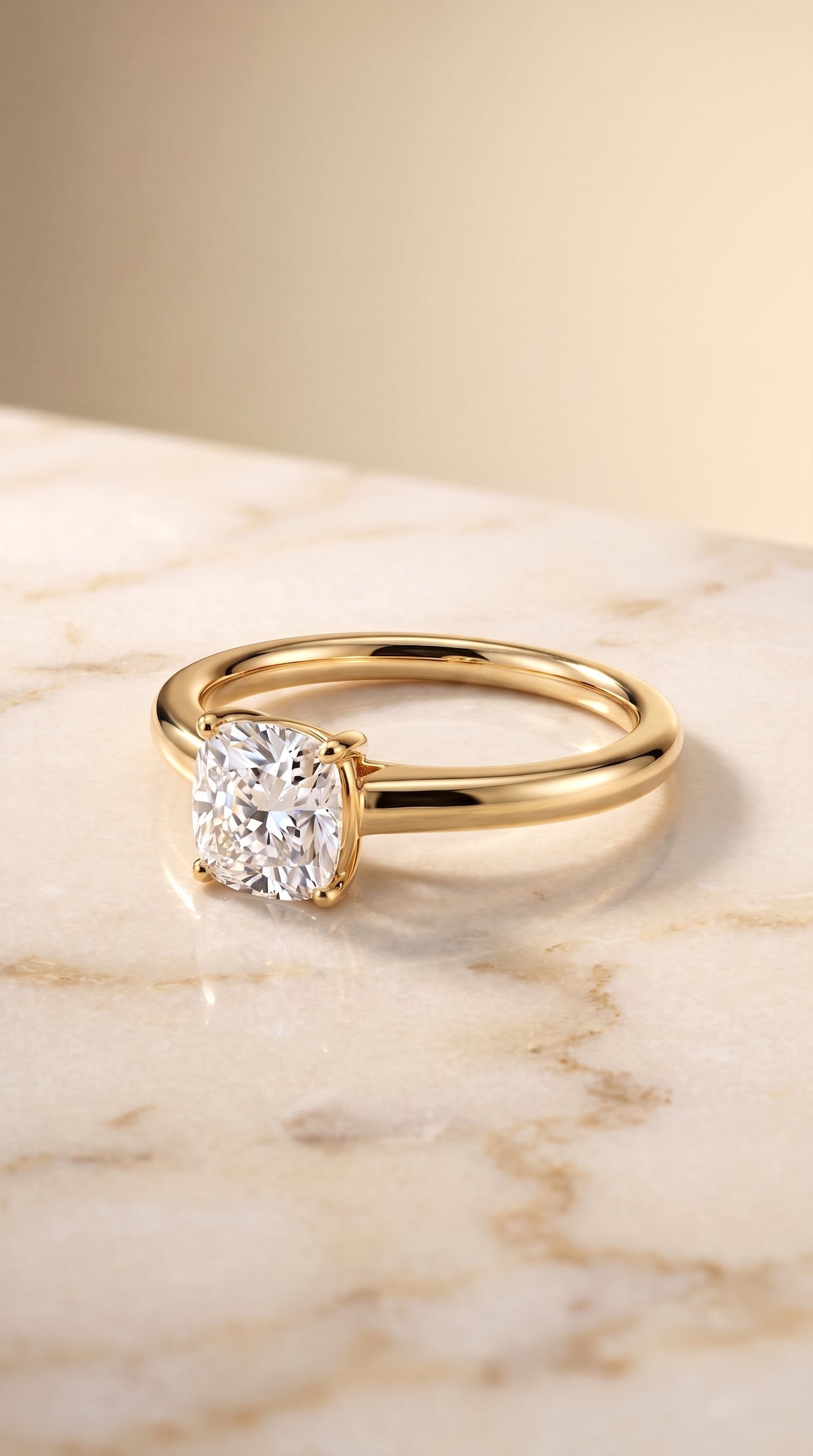 Viola Select Solitaire Cushion Cut Lab Diamond Engagement Ring in 18K Yellow Gold, shown on hand, angled | RockHer