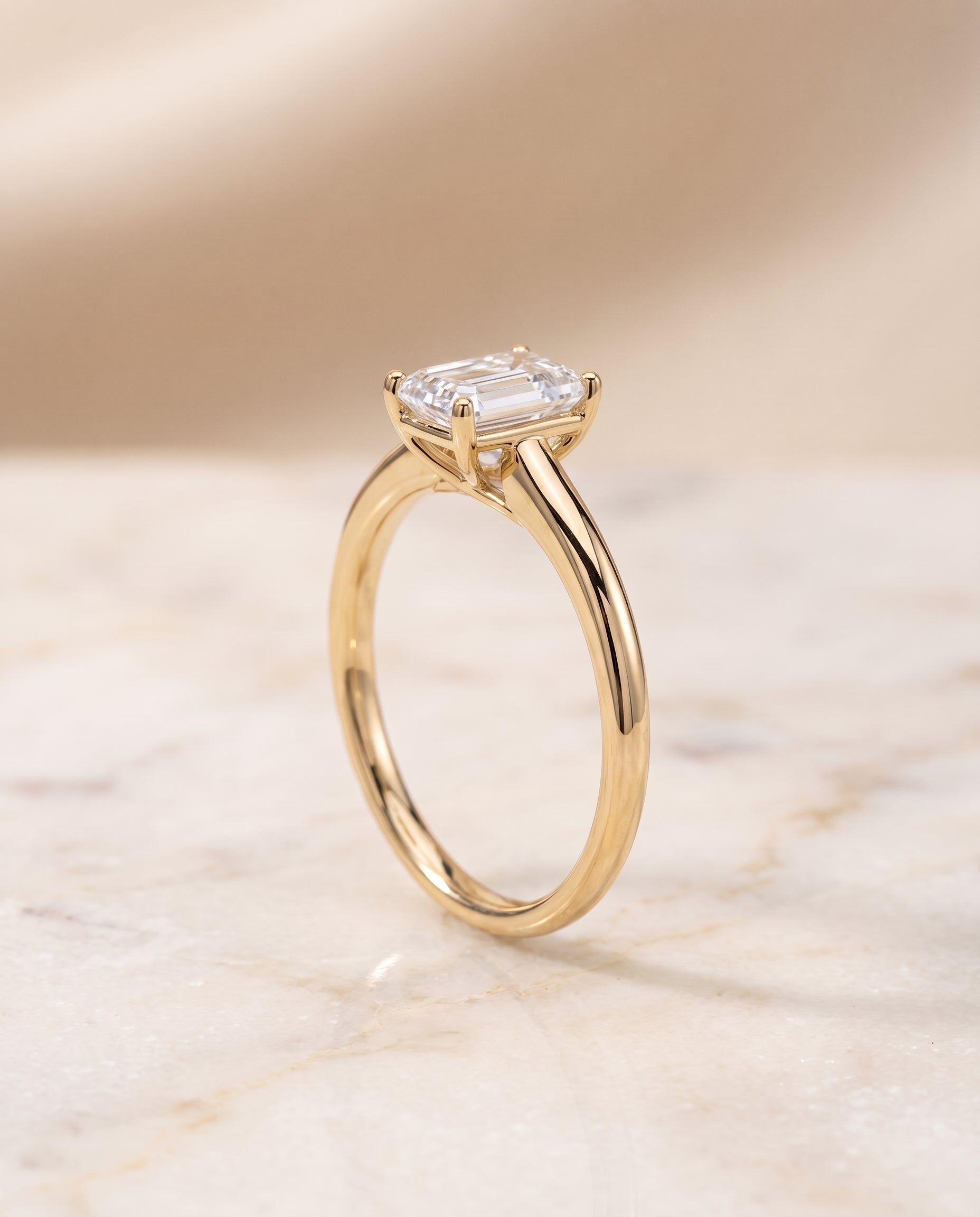 The Viola Contemporary Comfort Fit Flat Shank Solitaire Emerald Cut Engagement Ring Setting in 18K Yellow Gold