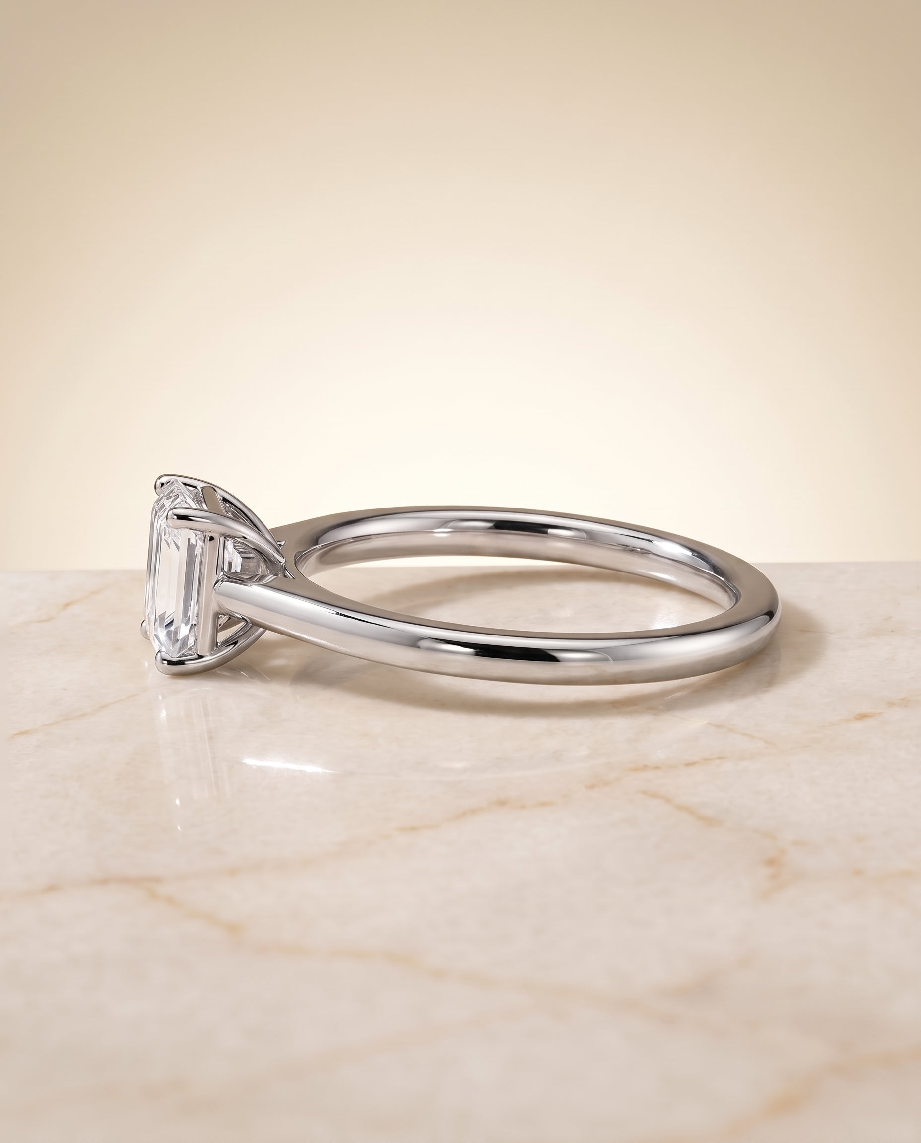 The Viola Contemporary Comfort Fit Flat Shank Solitaire Emerald Cut Engagement Ring Setting in Platinum