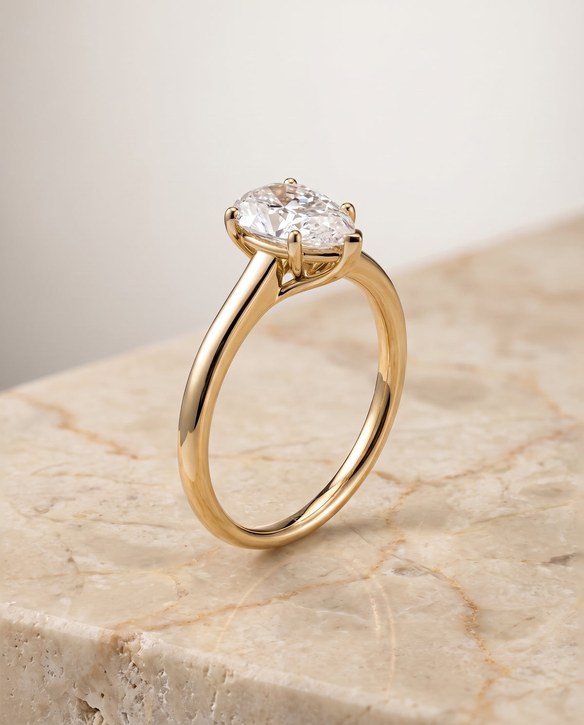 The Viola Contemporary Comfort Fit Flat Shank Solitaire Pear Engagement Ring Setting in 18K Yellow Gold