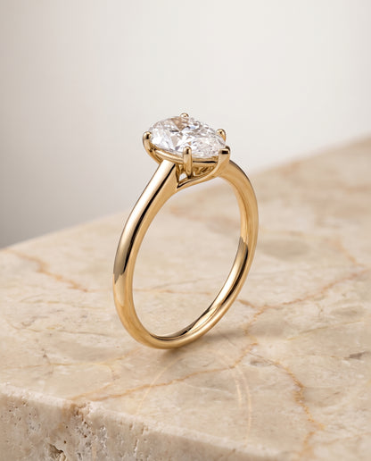 The Viola Contemporary Comfort Fit Flat Shank Solitaire Pear Engagement Ring Setting in 18K Yellow Gold