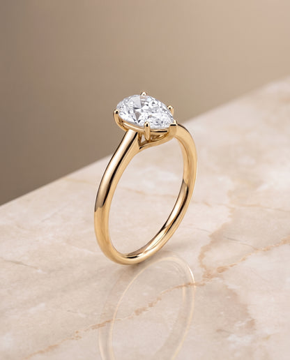 The Viola Contemporary Comfort Fit Flat Shank Solitaire Pear Engagement Ring Setting in 18K Yellow Gold