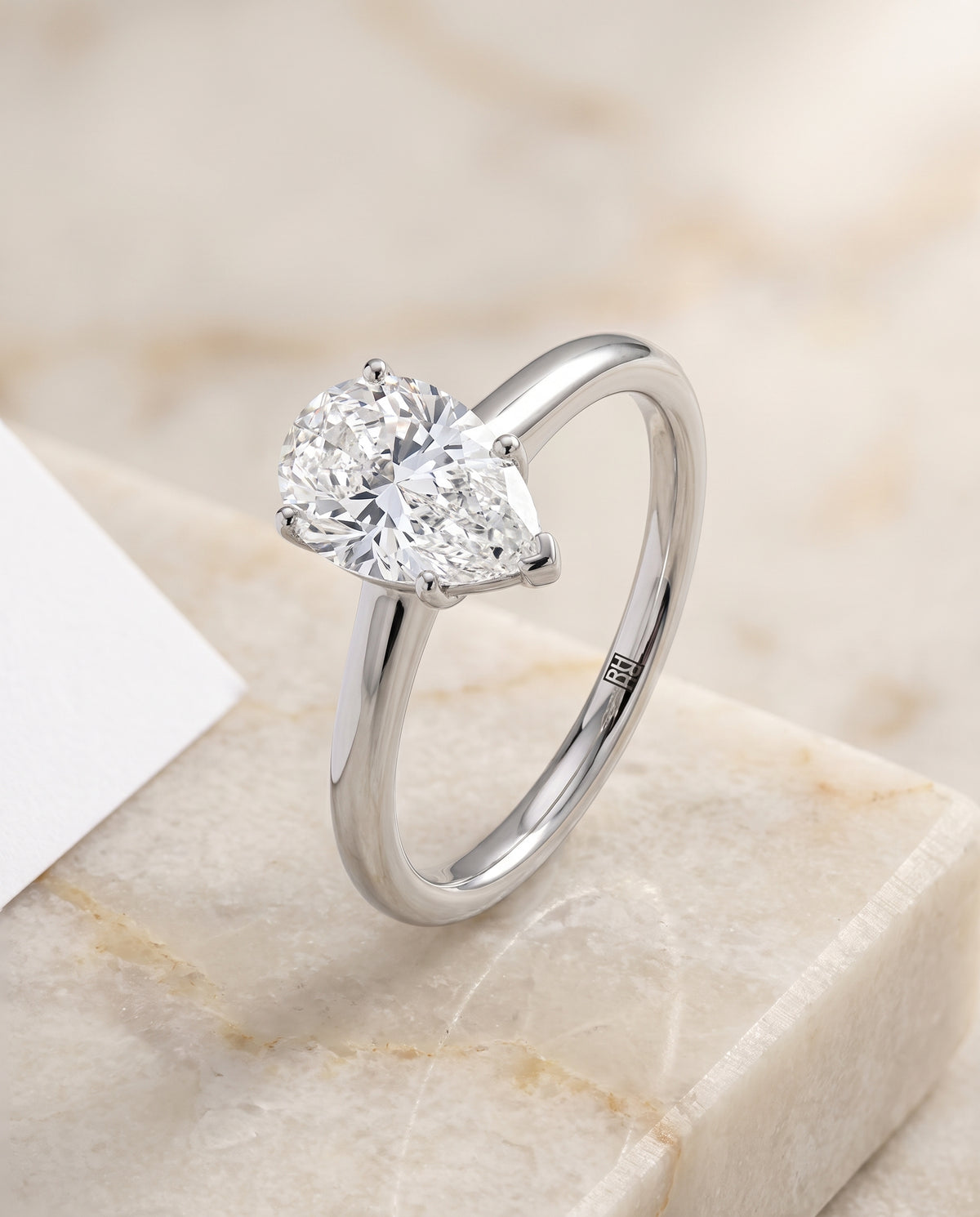 The Viola Contemporary Comfort Fit Flat Shank Solitaire Pear Engagement Ring Setting in Platinum