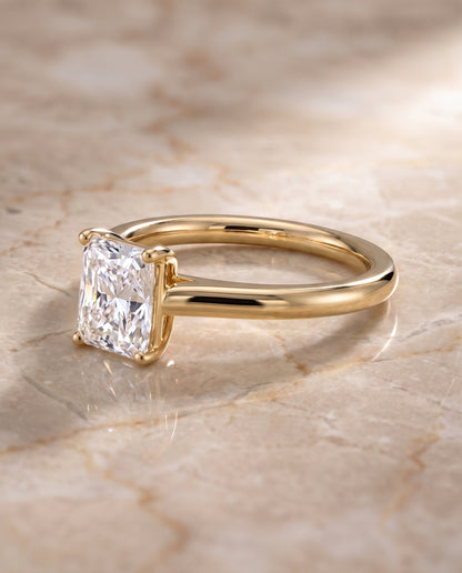 The Viola Contemporary Comfort Fit Flat Shank Solitaire Radiant Cut Engagement Ring Setting in 18K Yellow Gold