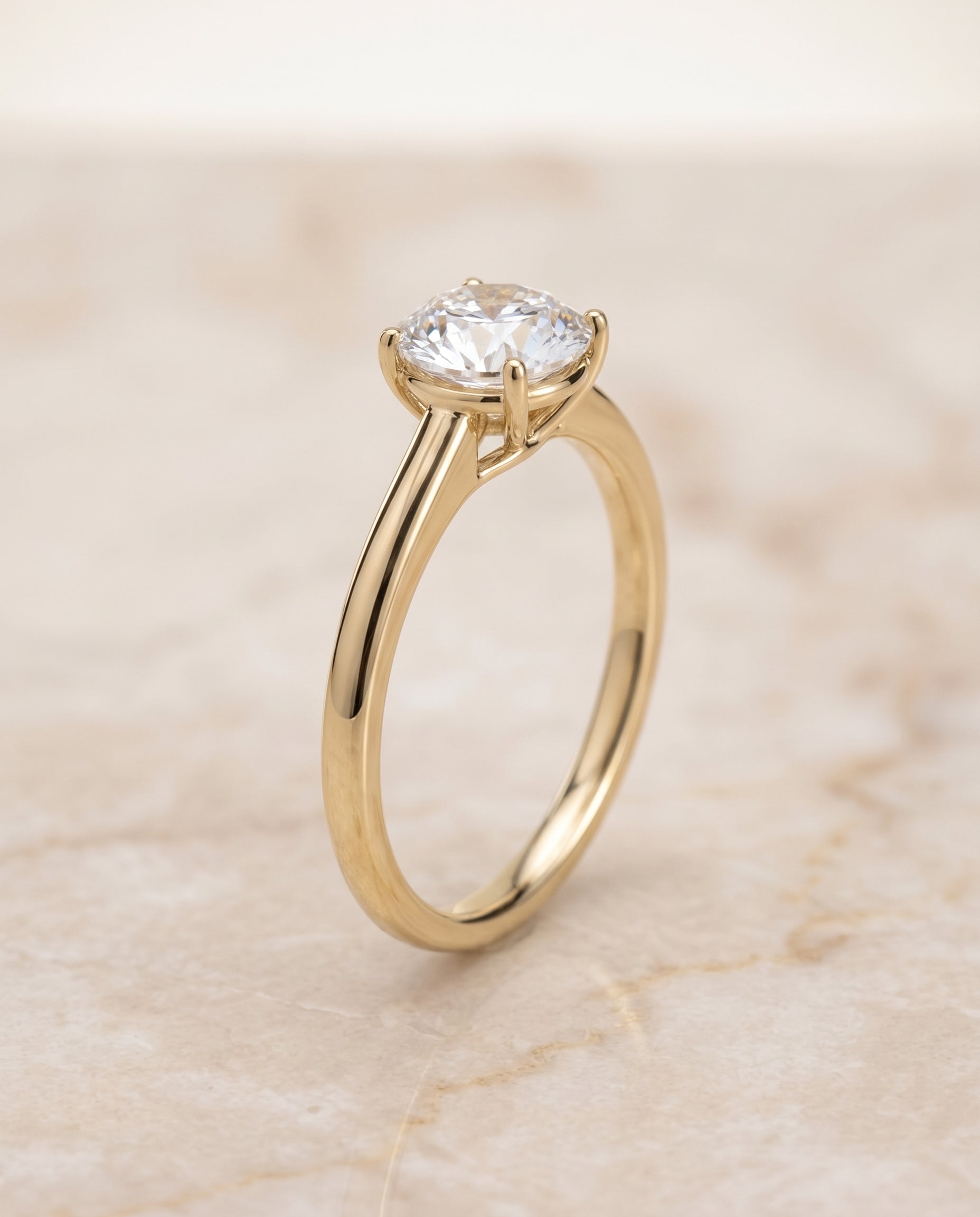 The Viola setting for round diamonds, made to order in 18K Yellow Gold | RockHer