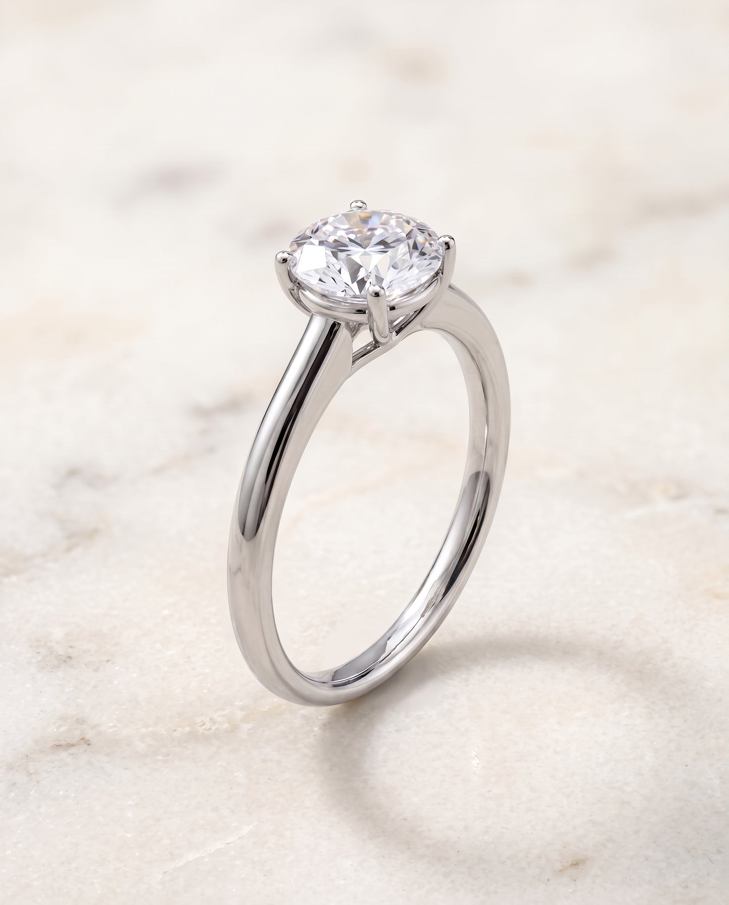 The Viola Contemporary Comfort Fit Flat Shank Solitaire Round Engagement Ring Setting in 18K White Gold