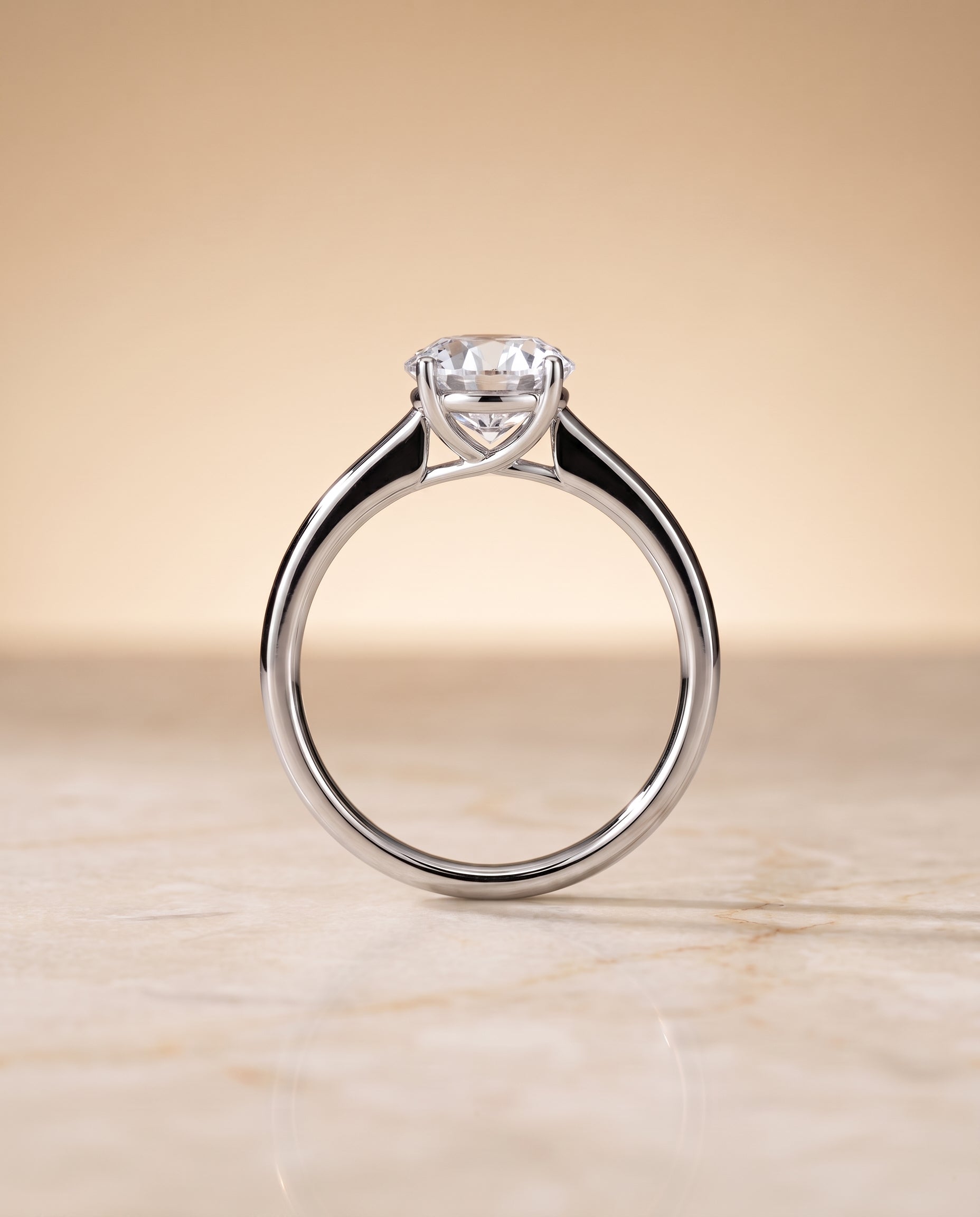 The Viola Contemporary Comfort Fit Flat Shank Solitaire Round Engagement Ring Setting in 18K White Gold
