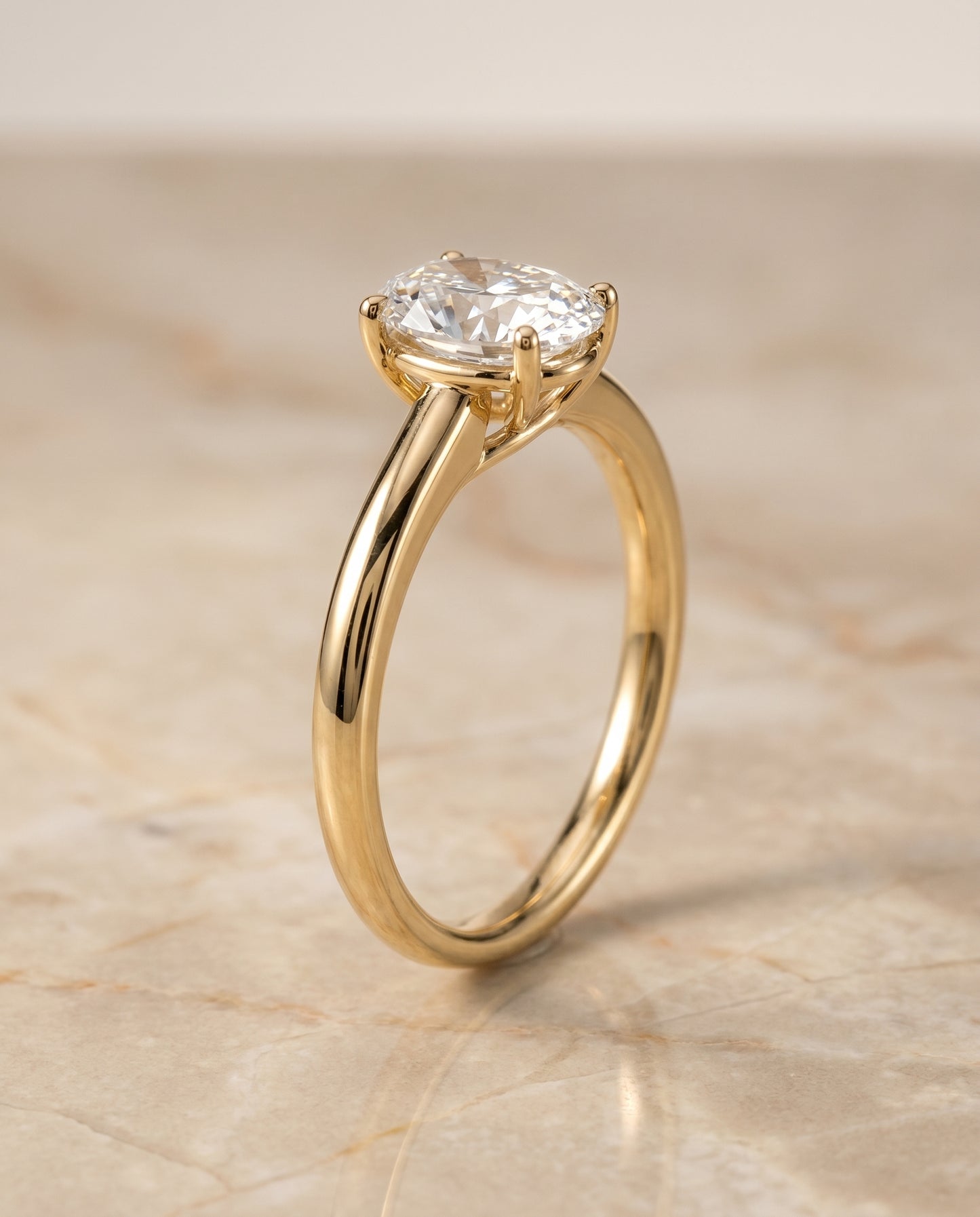 The Viola Contemporary Comfort Fit Flat Shank Solitaire Oval Engagement Ring Setting in 18K Yellow Gold