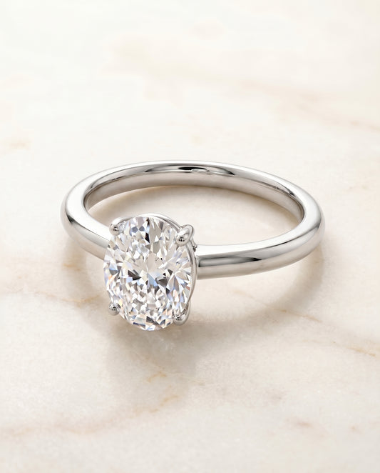 The Viola Solitaire Engagement Ring Setting for Oval Diamonds in 18K White Gold