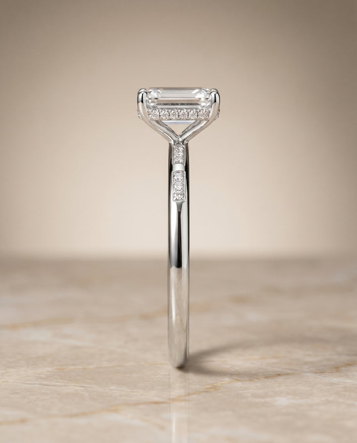 The Wanda Hidden Halo Solitaire Engagement Ring Setting for Emerald Cut Diamonds in Platinum
