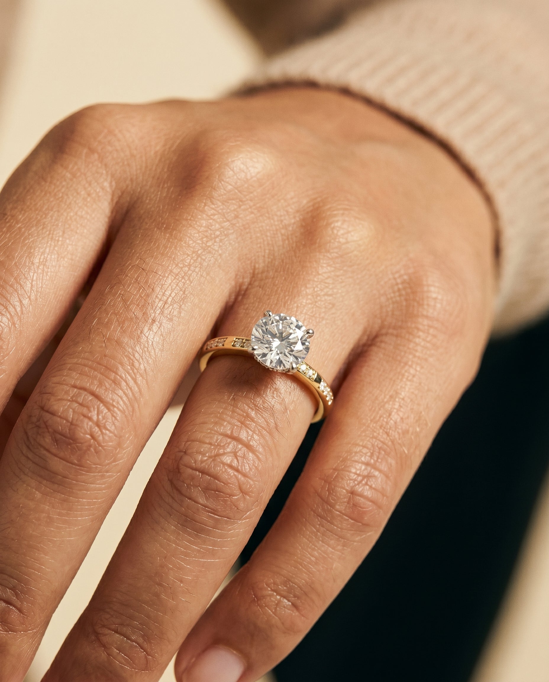 Wanda Select Hidden Halo Pavé Solitaire Round Lab Diamond Engagement Ring in 18K Yellow Gold, shown on hand | RockHer