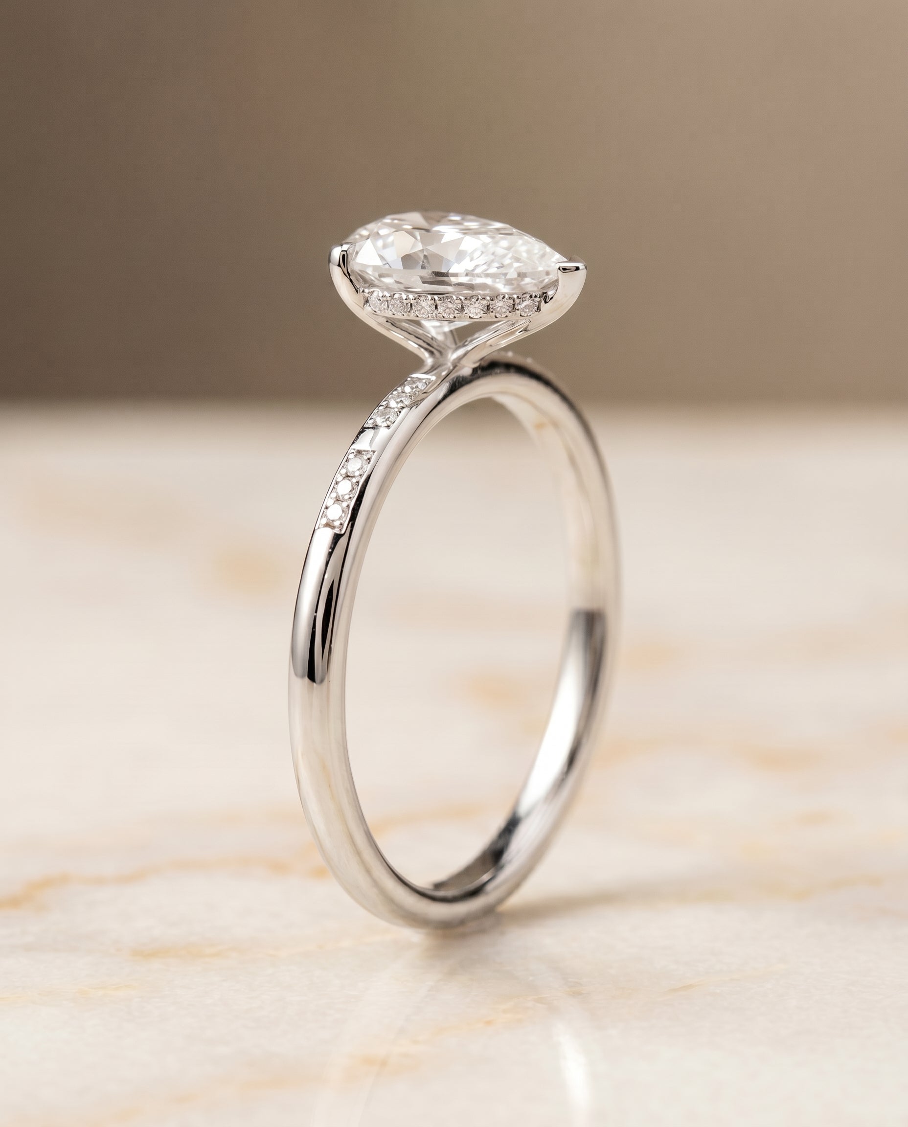 Hidden Halo Pavé Solitaire styling on The Wanda princess engagement ring setting | RockHer