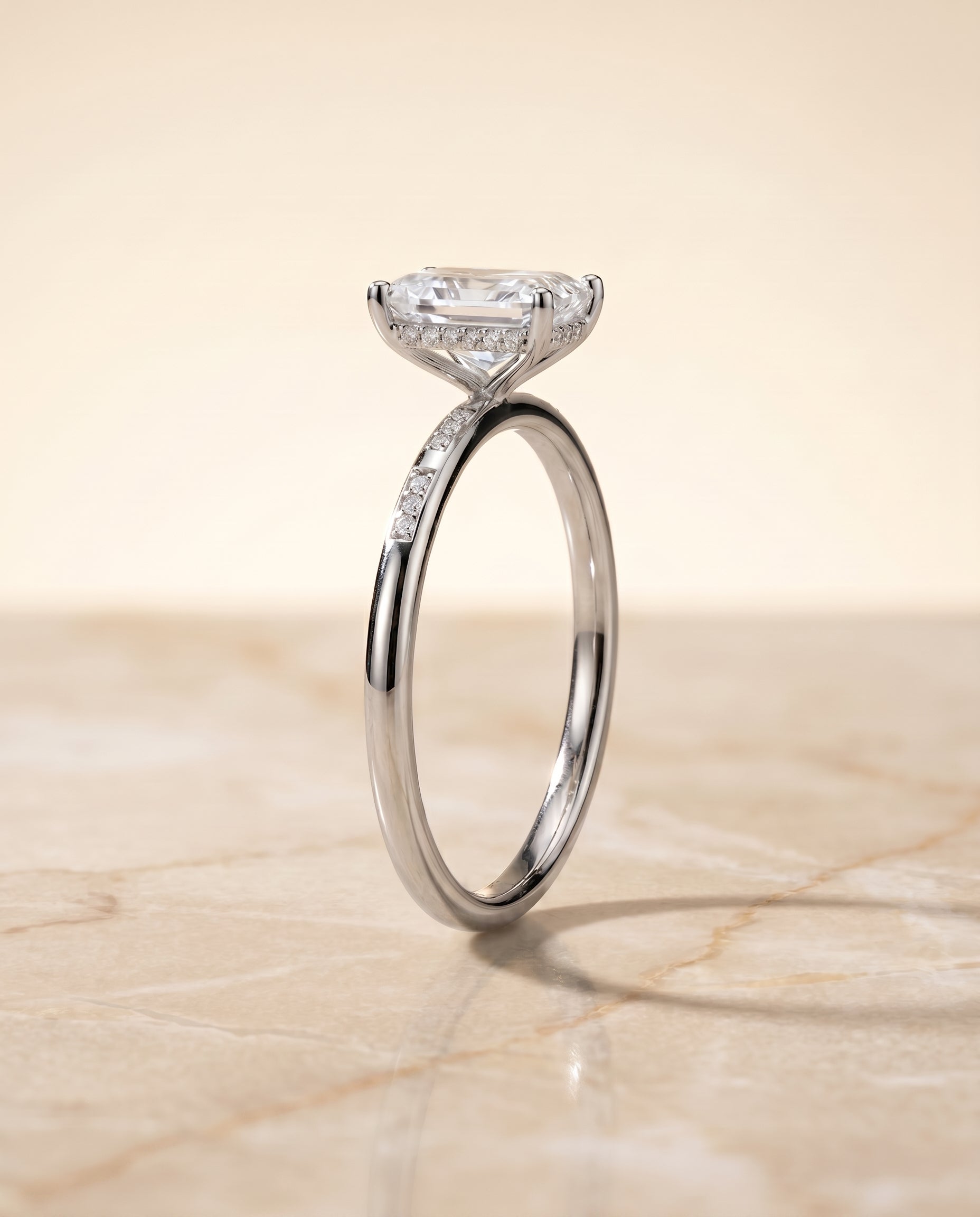 Hidden Halo Pavé Solitaire Cut styling on The Wanda radiant engagement ring setting | RockHer