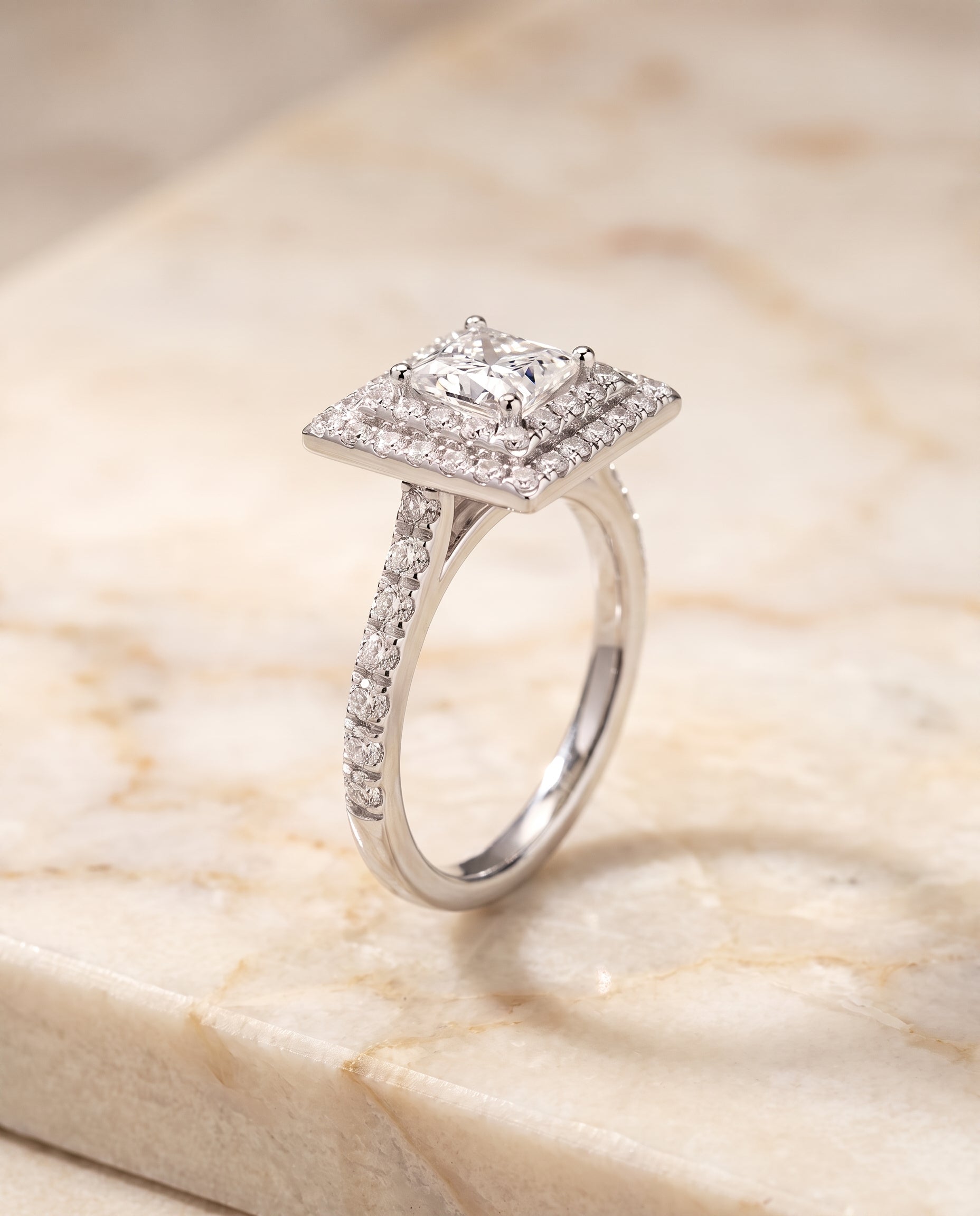 Double Halo styling on The Whitney princess engagement ring setting | RockHer