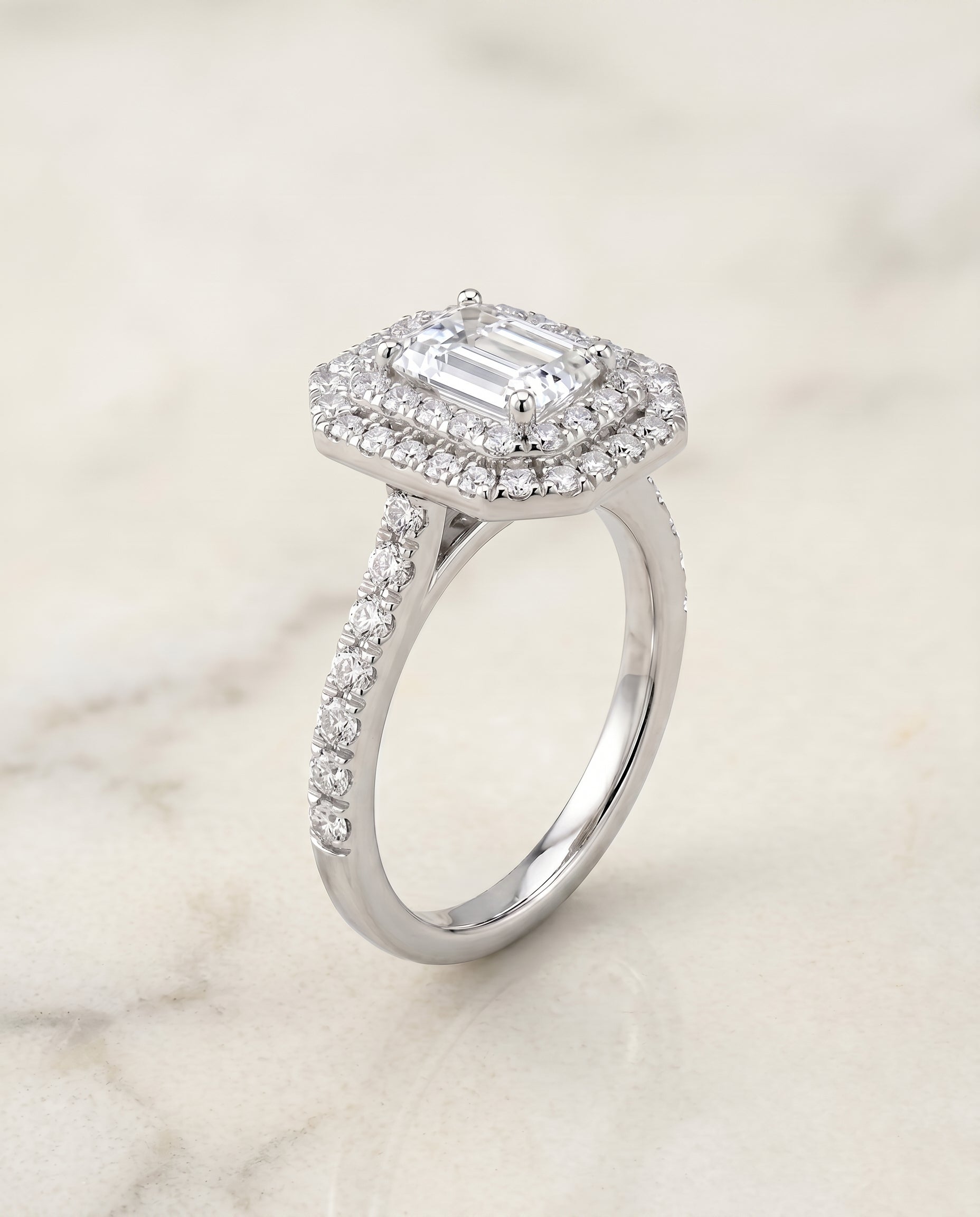 Double Halo Cut styling on The Whitney emerald engagement ring setting | RockHer