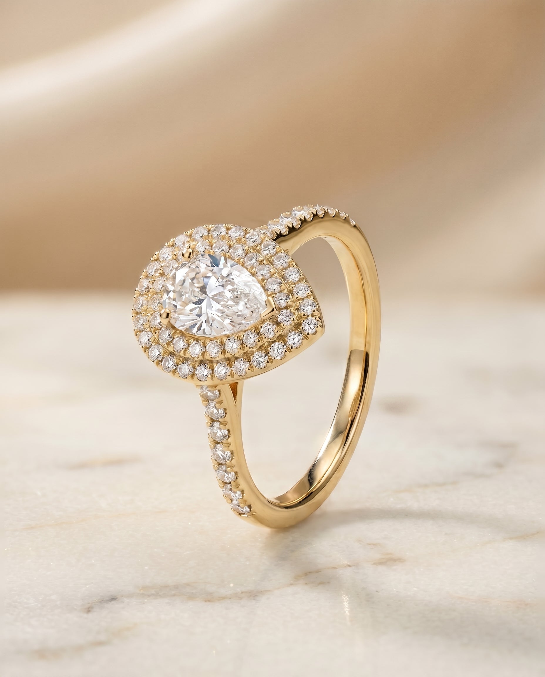 Double Halo styling on The Whitney pear engagement ring setting | RockHer