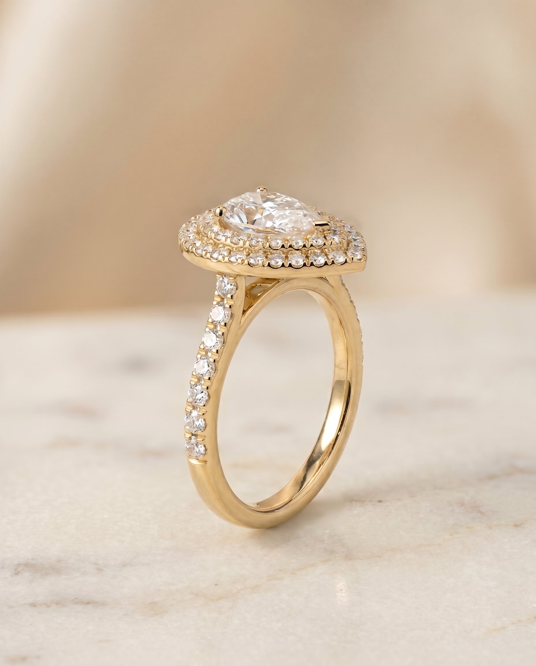 The Whitney setting for pear diamonds, made to order in 18K Yellow Gold | RockHer