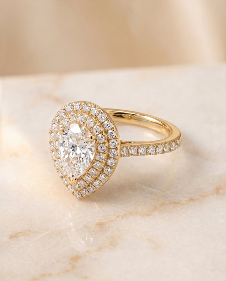 Whitney Select Double Halo Pear Lab Diamond Engagement Ring in 18K Yellow Gold, shown on hand, angled | RockHer