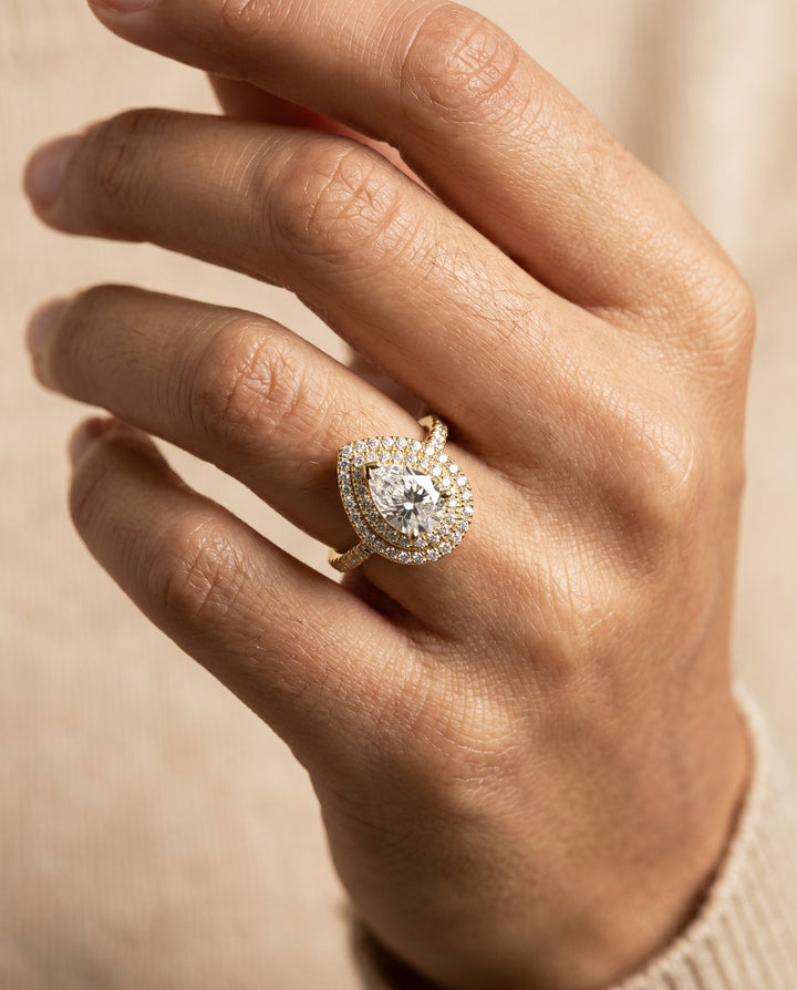 Whitney Select Double Halo Pear Lab Diamond Engagement Ring in 18K Yellow Gold, shown on hand | RockHer