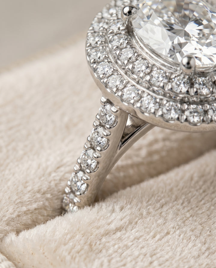 The Whitney Pavé Halo Engagement Ring Setting for Oval Diamonds in 18K White Gold