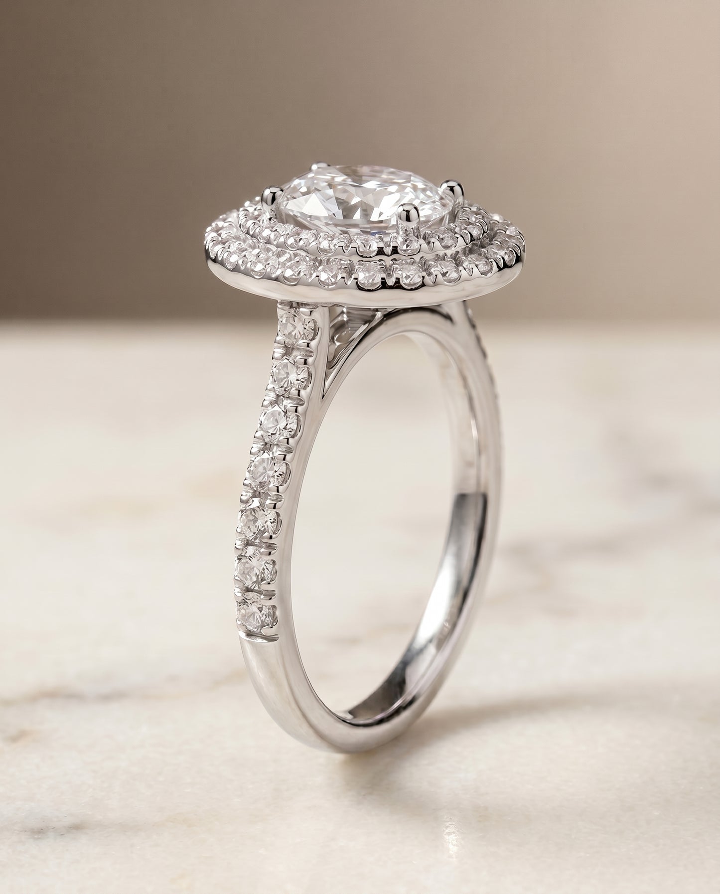 The Whitney Pavé Halo Engagement Ring Setting for Oval Diamonds in 18K White Gold