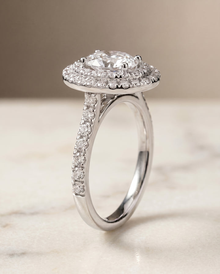 The Whitney Pavé Halo Engagement Ring Setting for Oval Diamonds in 18K White Gold