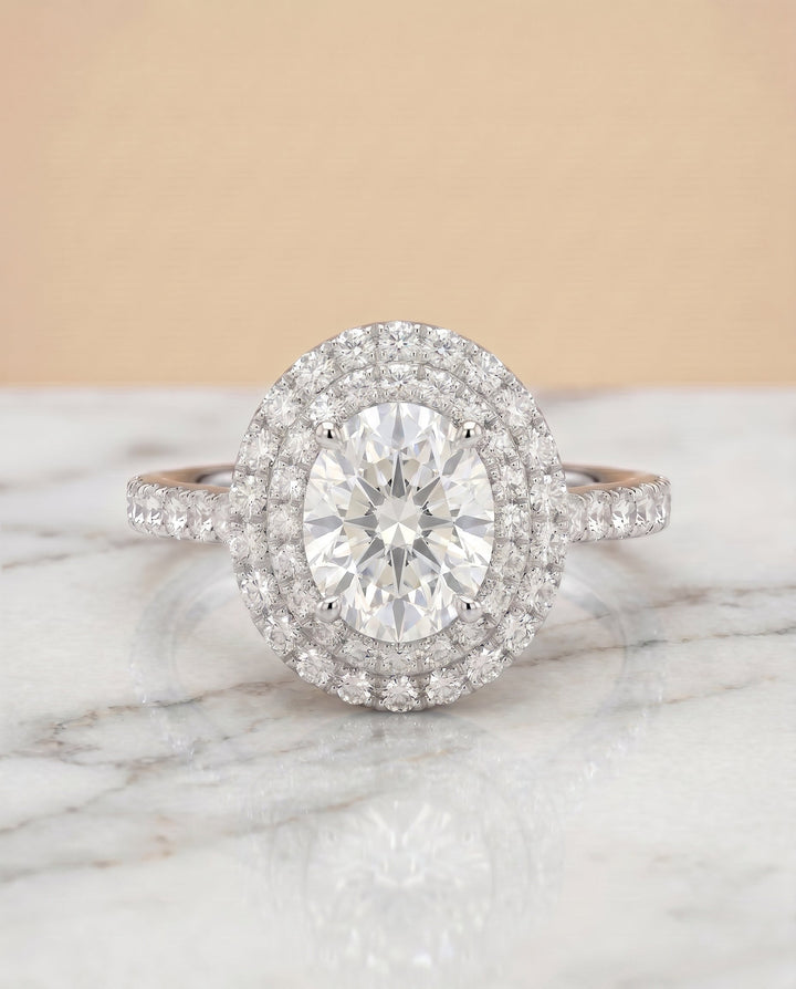 Whitney Select Double Halo Oval Lab Diamond Engagement Ring in Platinum, shown on hand, angled | RockHer