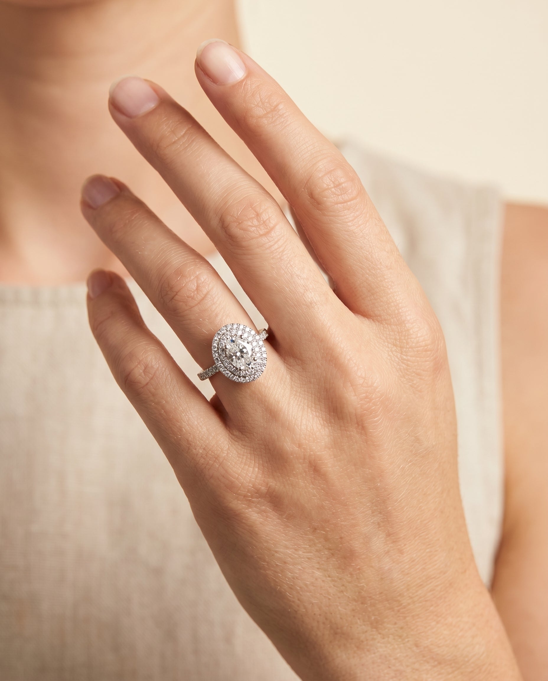 Whitney Select Double Halo Oval Lab Diamond Engagement Ring in Platinum, shown on hand | RockHer