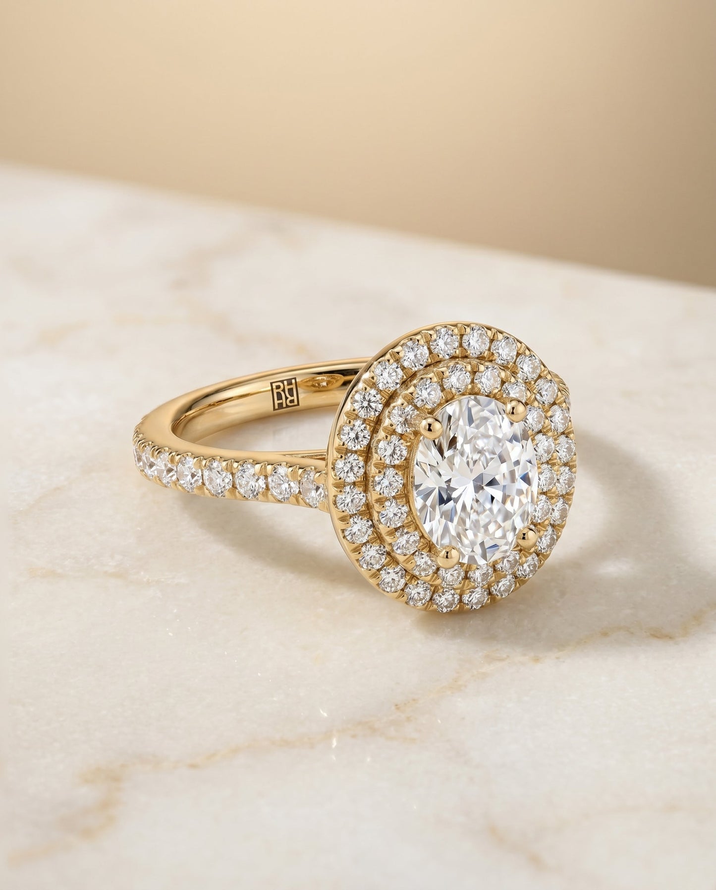 Whitney Select Double Halo Oval Lab Diamond Engagement Ring in 18K Yellow Gold, shown on hand, angled | RockHer