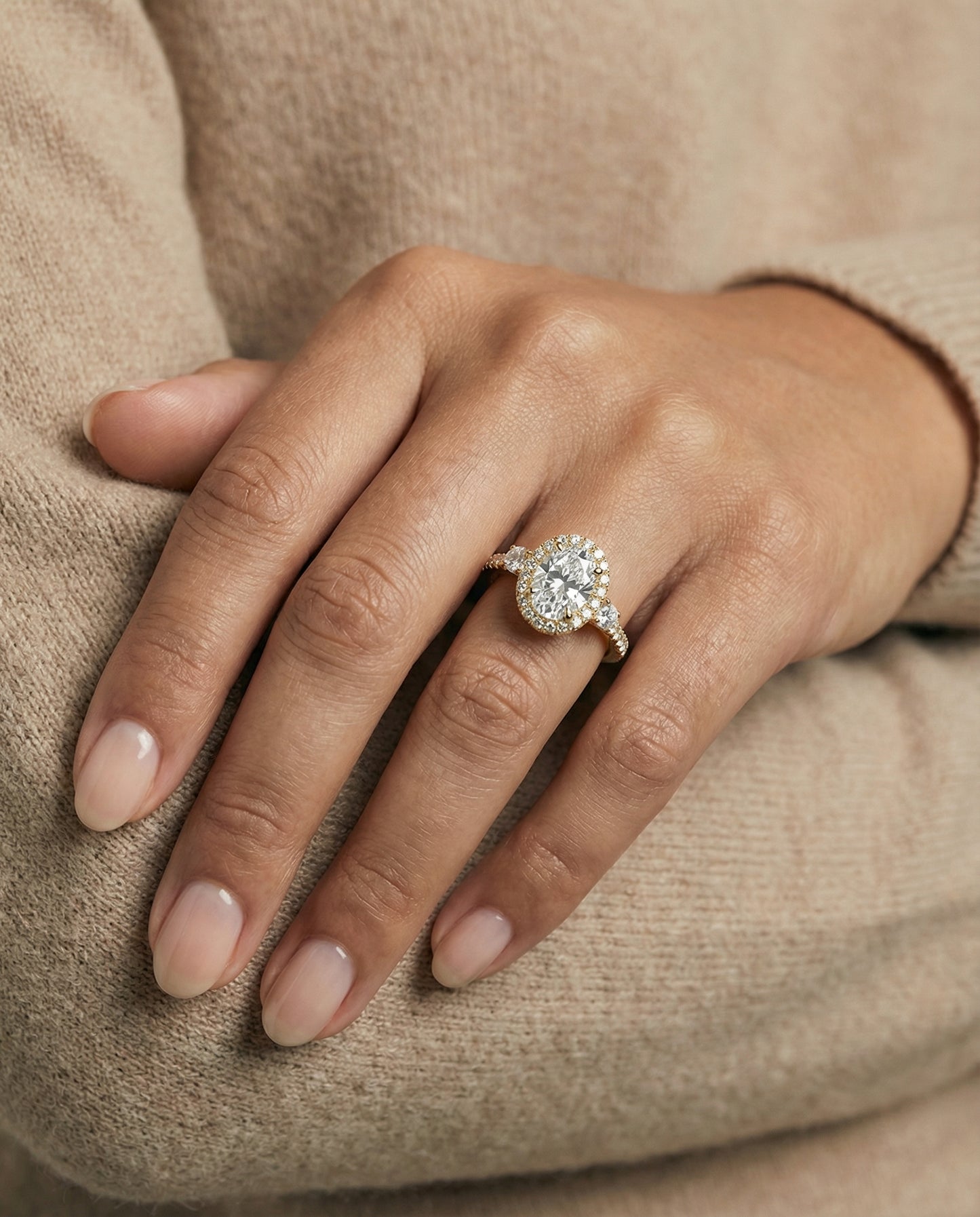 Three Stone Delicate Halo Oval, in 18K Yellow Gold – lifestyle shot | RockHer