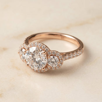 The Andrea Three Stone Halo Round Engagement Ring Setting in 14K Rose Gold