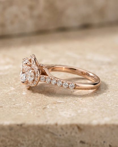 Round Brilliant, Three Stone Halo, in 14K Rose Gold, pave setting – side profile | RockHer