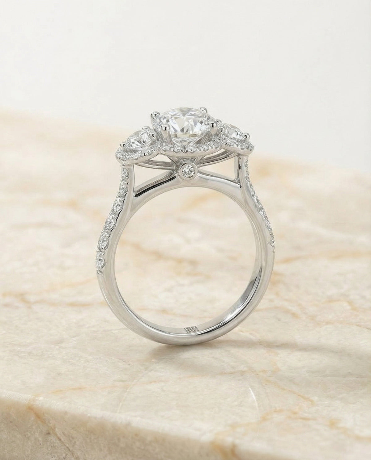 Andrea Select Three Stone Halo Round Lab Diamond Engagement Ring in Platinum, side view | RockHer