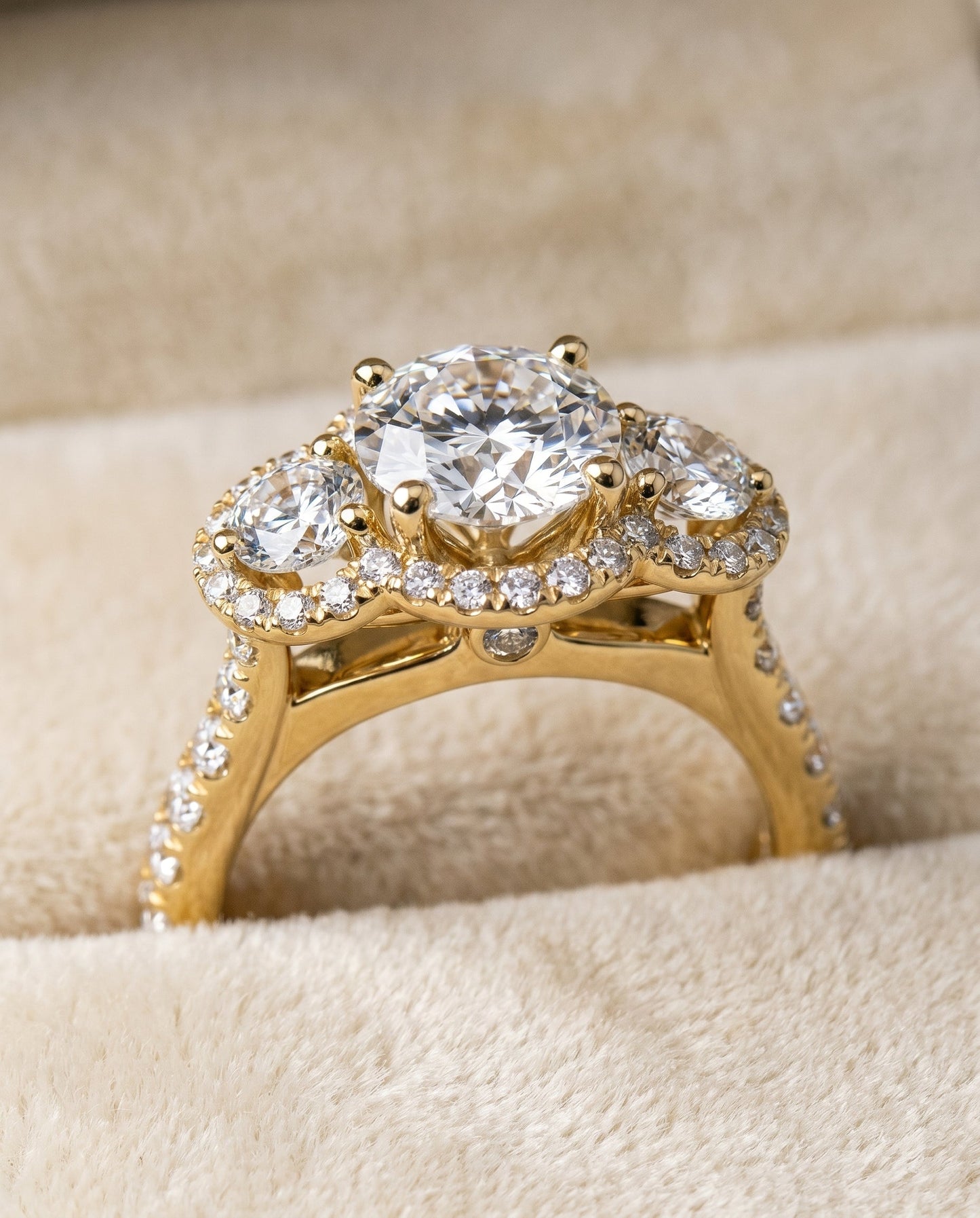 Andrea three stone halo engagement ring in 18K yellow gold with round lab diamond — RockHer