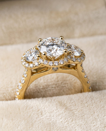 Andrea three stone halo engagement ring in 18K yellow gold with round lab diamond — RockHer