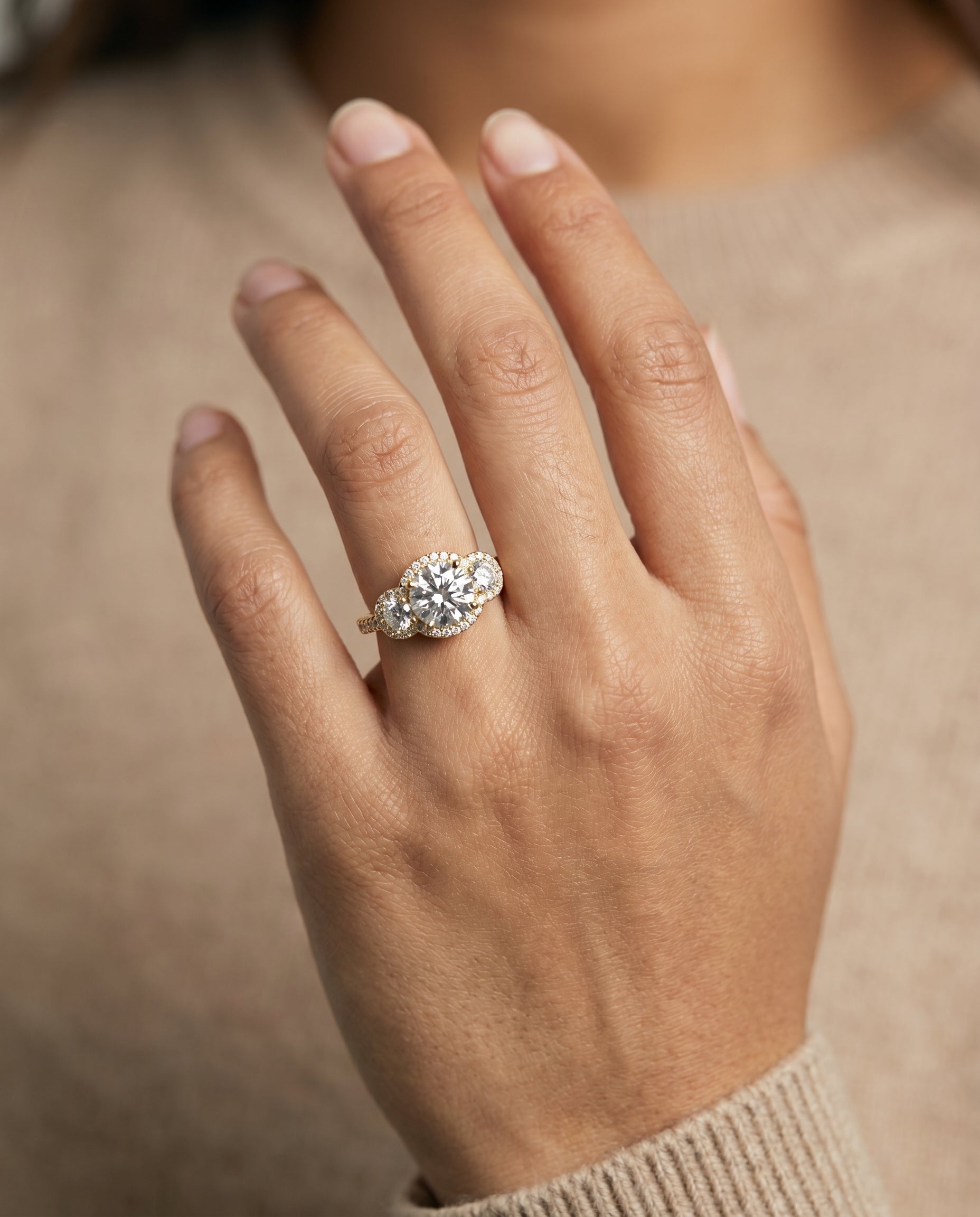 The Andrea engagement ring setting in 18K Yellow Gold, three stone halo design | RockHer