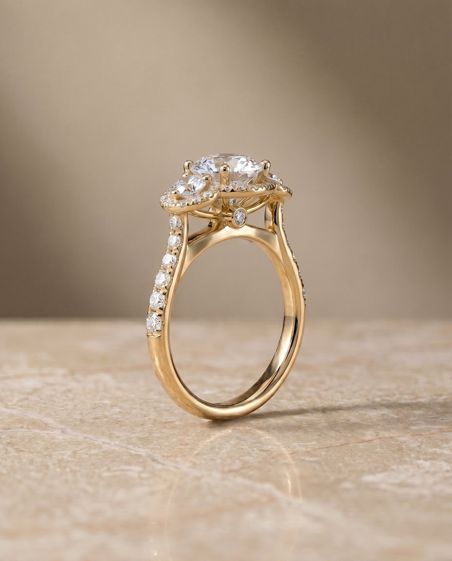 Andrea Select Three Stone Halo Round Lab Diamond Engagement Ring in 14K Yellow Gold, side view | RockHer