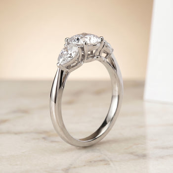 The Angelica Three Stone Matched Cushion Cut Engagement Ring Setting in Platinum