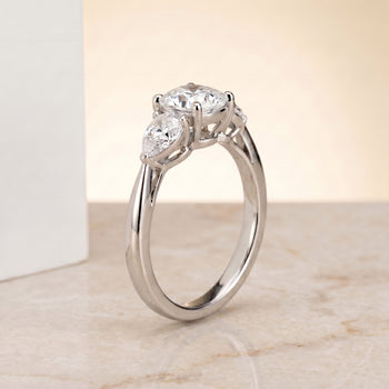 The Angelica Three Stone Matched Cushion Cut Engagement Ring Setting in 18K White Gold