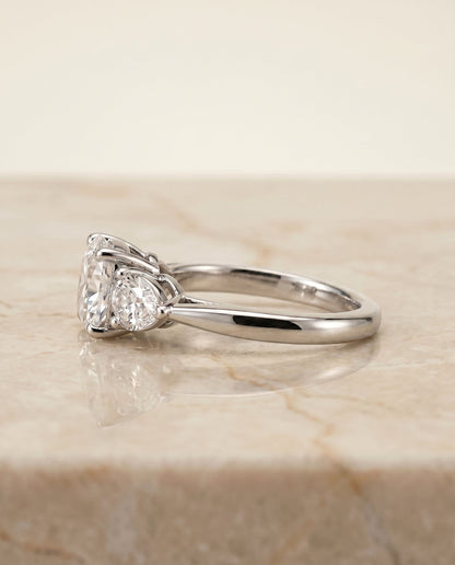 Angelica Select Three Stone Matched Cushion Cut Lab Diamond Engagement Ring in Platinum, side view | RockHer