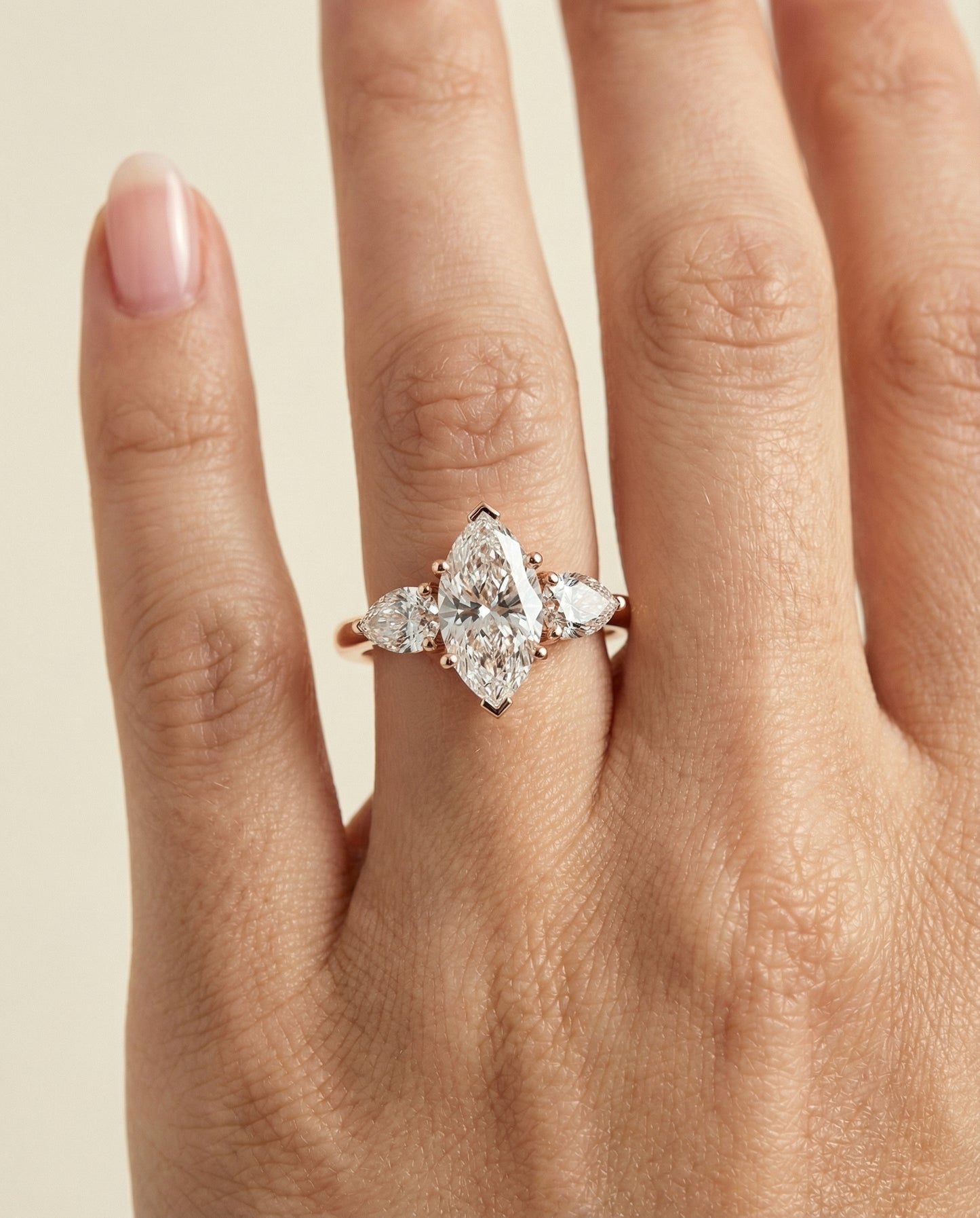 Three Stone Matched Shape Marquise, in 14K Rose Gold, prong setting – lifestyle shot | RockHer