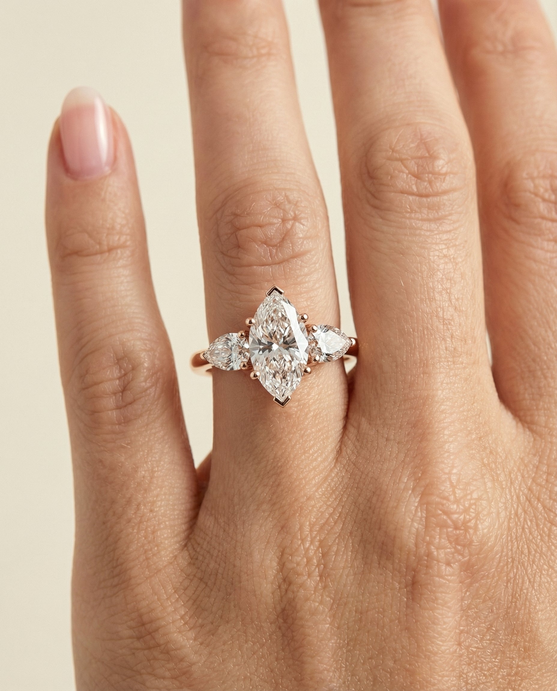 The Angelica engagement ring setting in 14K Rose Gold, three stone matched design | RockHer