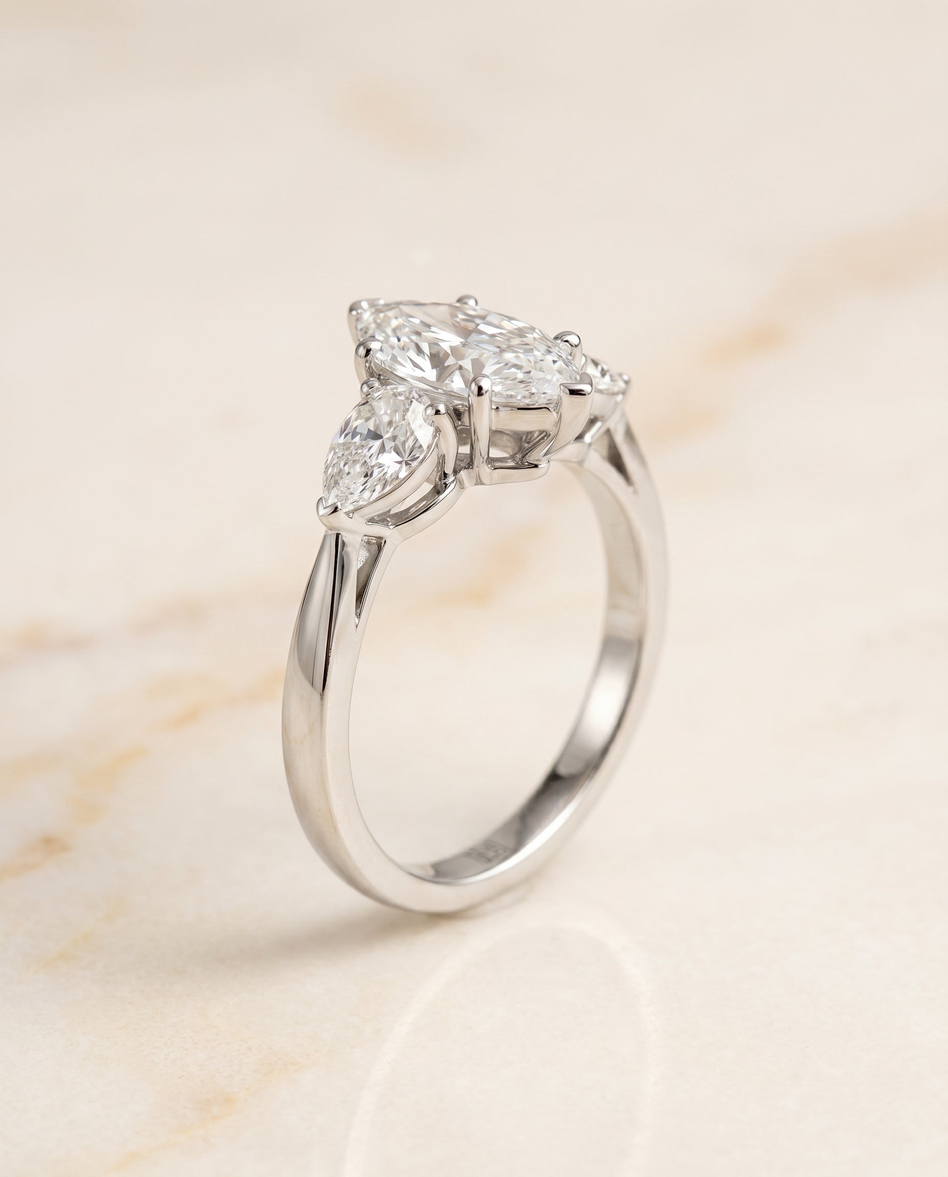 The Angelica three stone matched engagement ring setting, shown in Platinum | RockHer