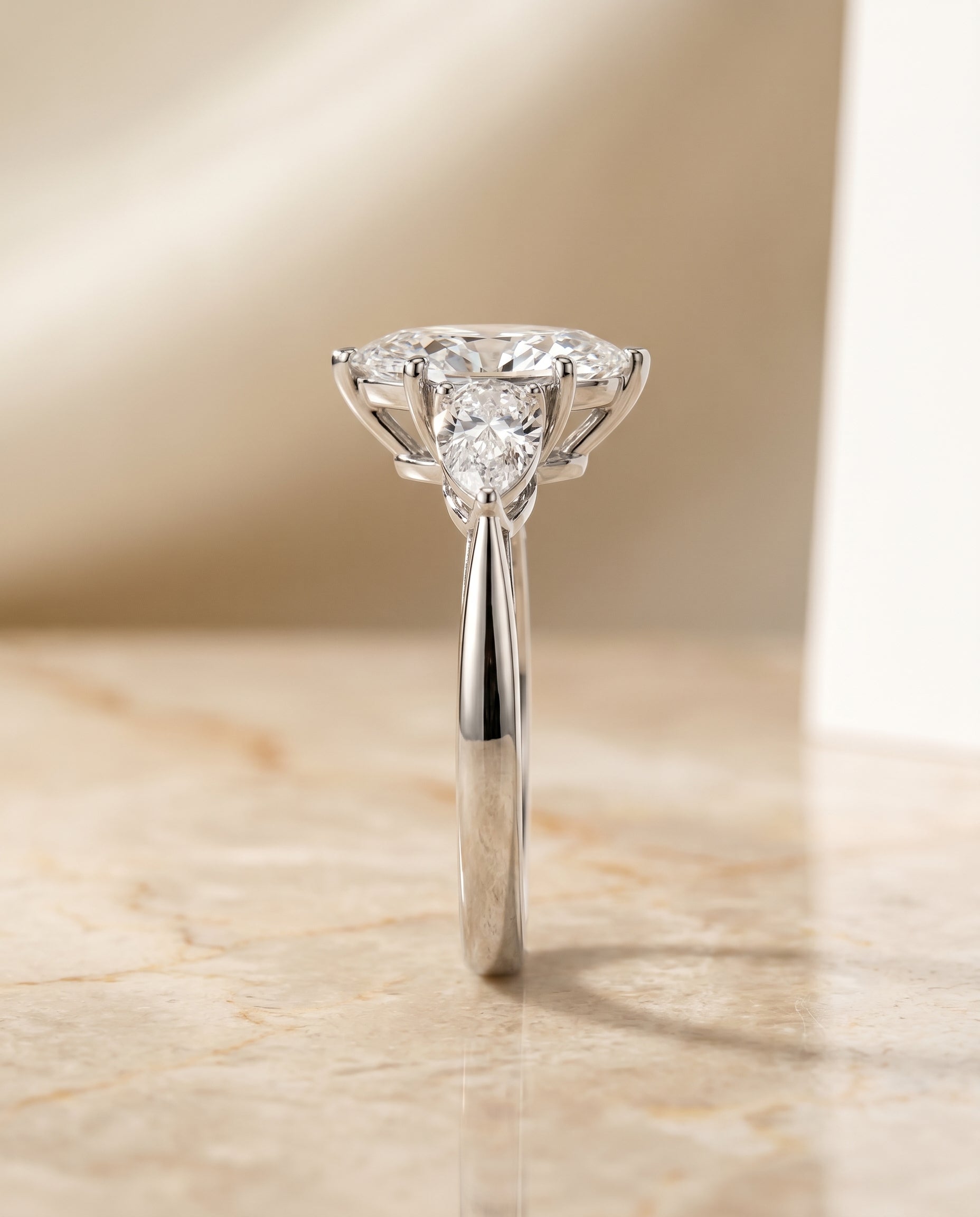 Three Stone Matched styling on The Angelica marquise engagement ring setting | RockHer