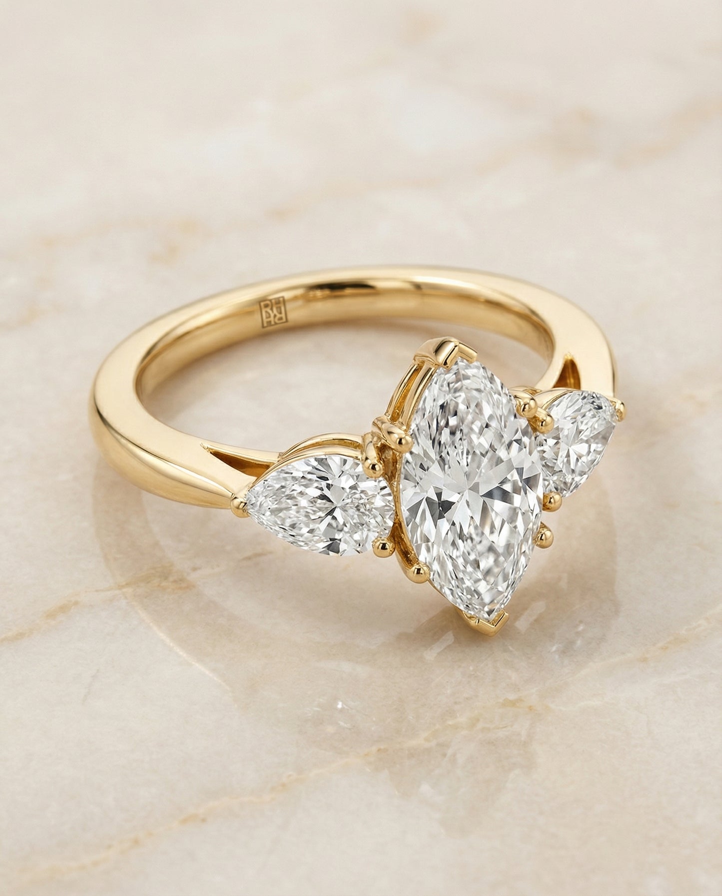 Three Stone Matched Shape Marquise, in 18K Yellow Gold, prong setting – angled view | RockHer