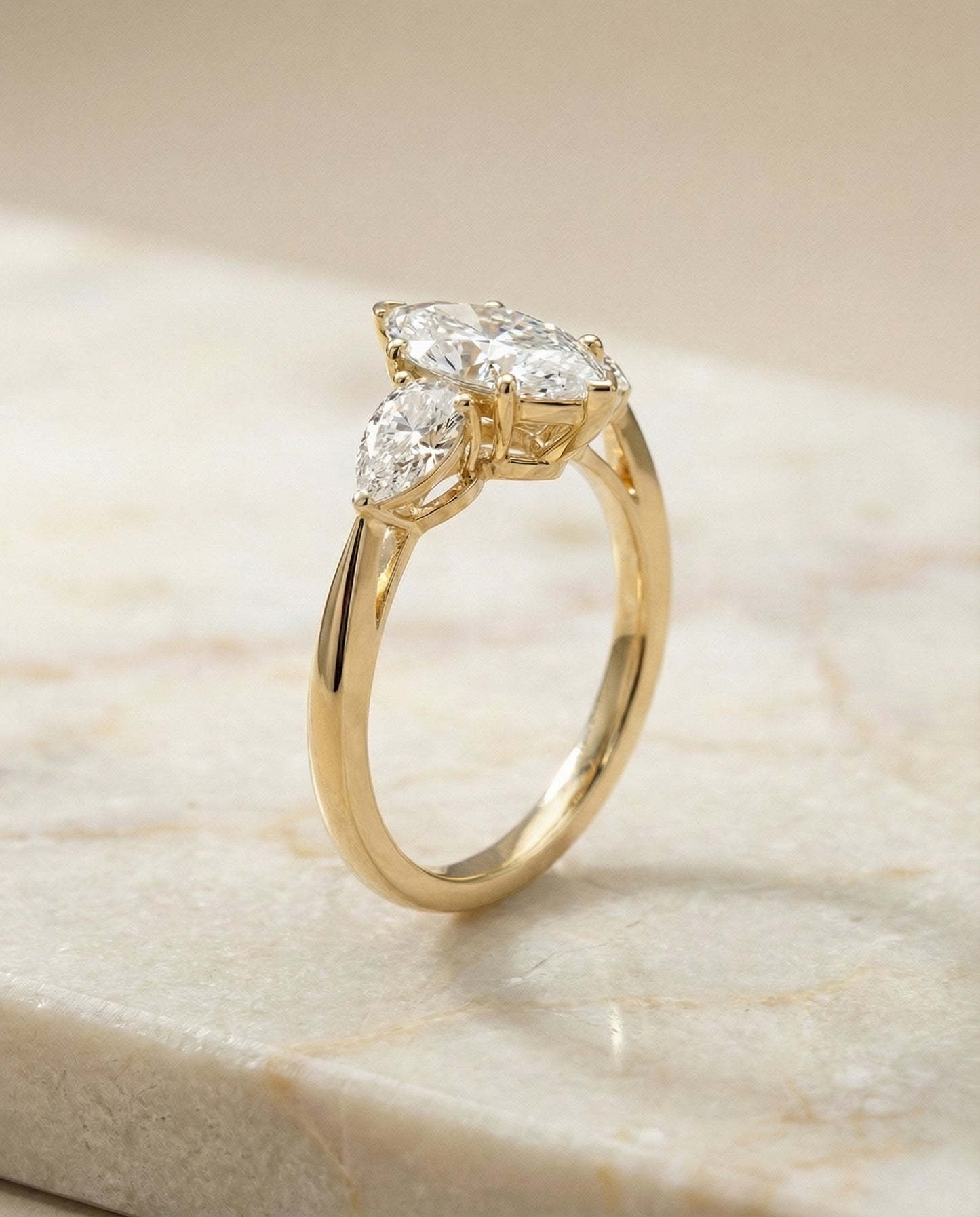 Three Stone Matched Shape Marquise, in 18K Yellow Gold, prong setting – front view | RockHer